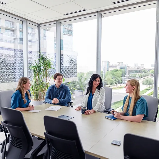 Advisory conversation in office lounge