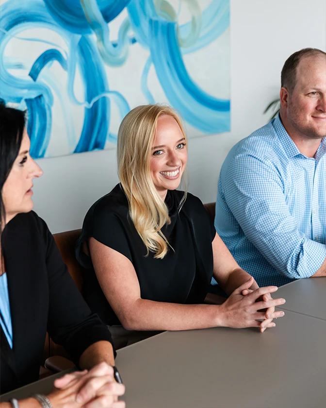 7 Pillars Advisory team members collaborating at a meeting table